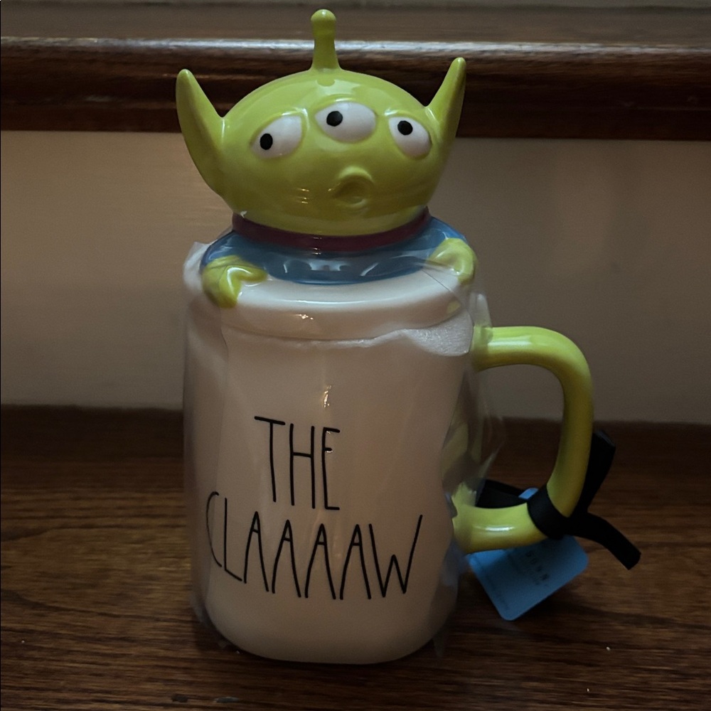 Rae Dunn x Toy Story “The Claaaw” Alien mug with topper!